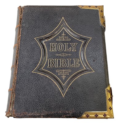 Lot 382 - A 19th century leather bound Bible.