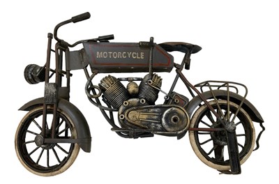 Lot 476 - An early 20th century tin plate motorcycle,...