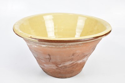 Lot 1407 - A large slipware terracotta dairy bowl, height...