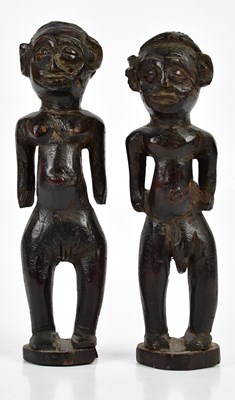 Lot 1333 - A pair of carved hardwood tribal fertility...