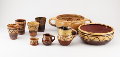 Lot 594 - Winchcombe Pottery; a group of slipware...