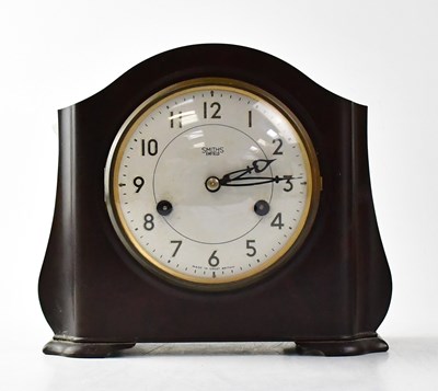 Lot 108 - SMITHS; a Bakelite mantel clock, the dial set...