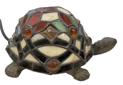 Lot 115 - A Tiffany style bronzed metal tortoise lamp...