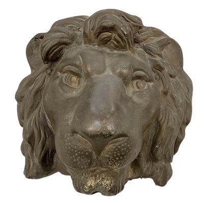 Lot 632 - A bronze wall mounted figure of a lion's head,...