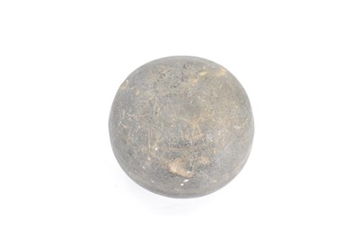 Lot 555 - An antique carved stone shot or canon ball,...