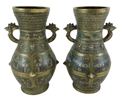 Lot 1092 - A pair of early 20th century Chinese brass...