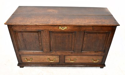 Lot 1504 - An 18th century oak coffer with hinged cover...