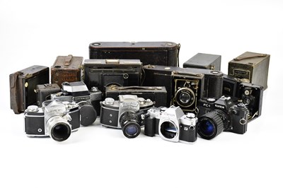 Lot 754 - A collection of film cameras, to include a...