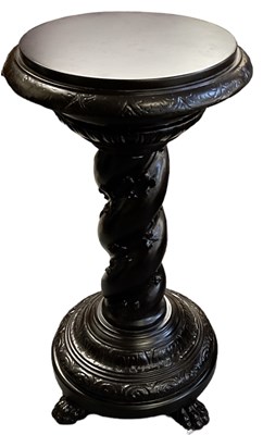 Lot 5 - An impressive large ebonised stand with...