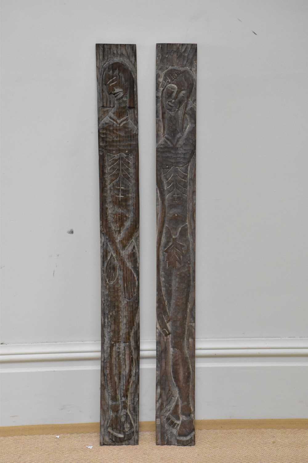 Lot 531 - Two carved Adam and Eve oak panels, 100cm.