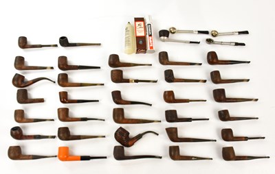 Lot 689 - A collection of smoking pipes, to include...