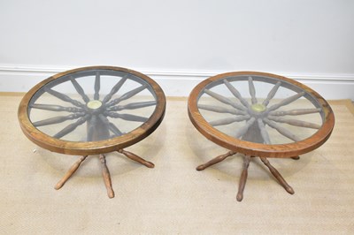 Lot 275 - A pair of modern oak cartwheel coffee tables...