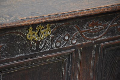 Lot 8 - A late 17th century carved oak mule chest with...
