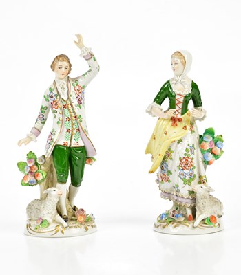 Lot 1557 - SITZENDORF; a pair of 20th century figures...