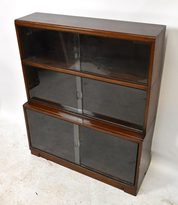 Lot 3017 - MINTY; a mahogany three tier bookcase with...