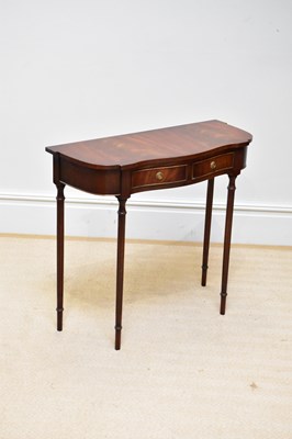 Lot 290 - A reproduction mahogany serpentine front side...