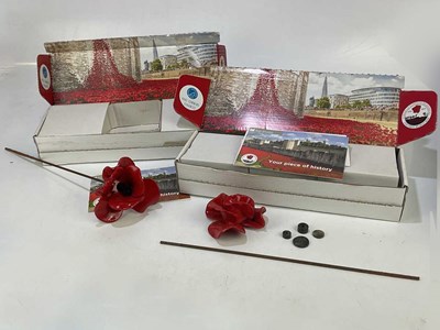 Lot 650 - PAUL CUMMINS; two boxed ceramic poppies to...