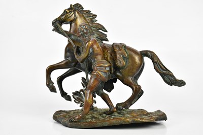 Lot 766 - A bronzed model of a Marly horse and groom,...