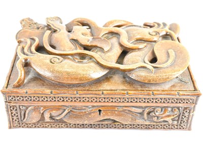 Lot 405 - A large wooden box with carved dragon and...