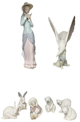 Lot 578 - LLADRÓ ; a porcelain blue, green and pale pink...