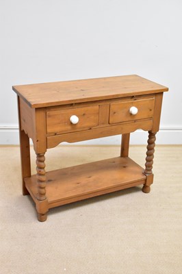 Lot 97 - A modern pine two drawer two tier side table,...