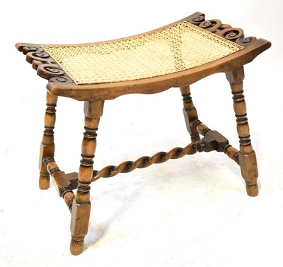 Lot 45 - An early 20th century cane-topped stool of...