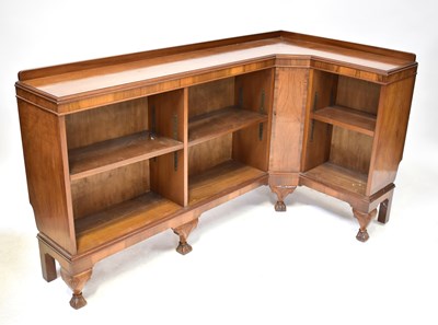 Lot 66 - A mahogany L-shaped bookcase, 83 x 152 x 80cm.