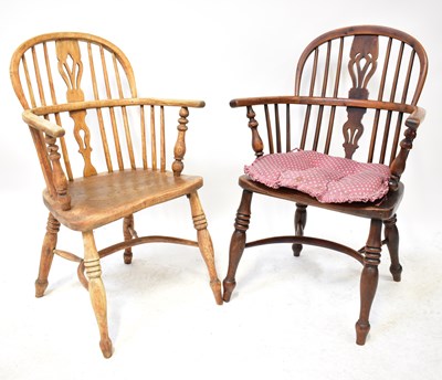Lot 36 - Two 19th century elm seated Windsor chairs (2).