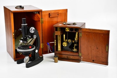 Lot 725 - A vintage mahogany cased microscope, together...