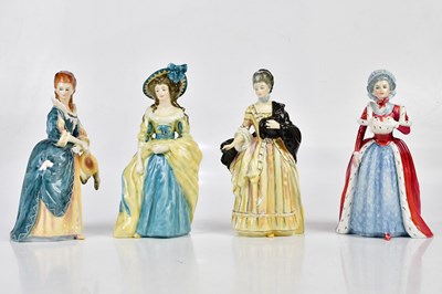 Lot 1520 - ROYAL DOULTON; a group of four figures...