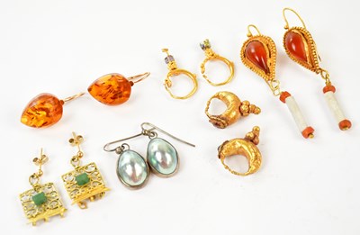Lot 2495 - A pair of 9ct yellow gold amber earrings,...