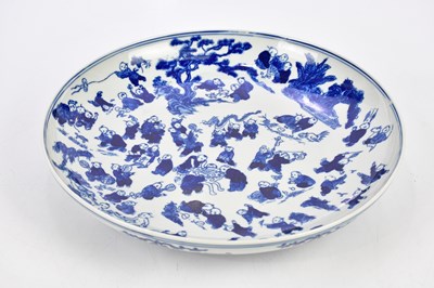 Lot 1252 - A modern Chinese blue and white bowl, painted...