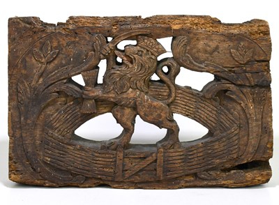 Lot 81 - A Dutch carved panel representing a crowned...