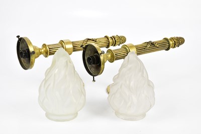 Lot 834 - A pair of brass wall lights modelled as...