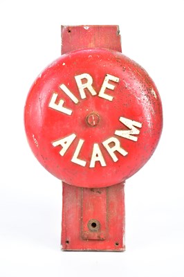 Lot 561 - A vintage cast iron fire alarm bell, on wooden...