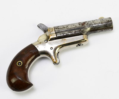 Lot 479 - COLT; a Derringer .41 rim fire pistol with 2...