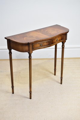 Lot 289 - A reproduction mahogany serpentine fronted two...