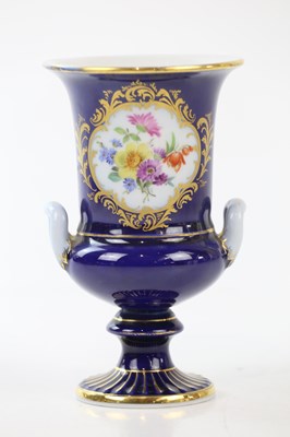 Lot 1384 - MEISSEN; a cobalt blue ground twin handled...