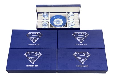 Lot 573 - A group of five boxed Superman espresso sets,...