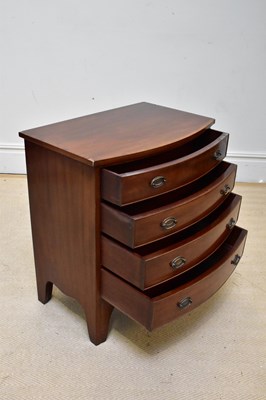 Lot 1082 - A reproduction mahogany bowfront chest, with...