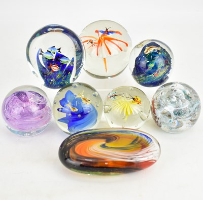 Lot 369 - Eight art glass paperweights comprising three...