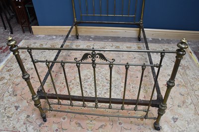 Lot 1631 - A Victorian brass double bedstead.