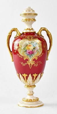 Lot 191 - ROYAL WORCESTER; a twin-handled waisted vase...