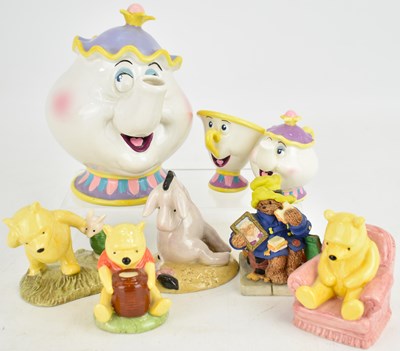 Lot 267 - DISNEY; seven ceramic collectible figures...