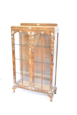 Lot 11 - A vintage mahogany two-door display cabinet...