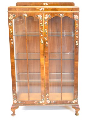 Lot 11 - A vintage mahogany two-door display cabinet...