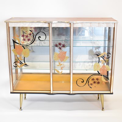 Lot 5 - A 1960s glass cocktail/display cabinet, with...