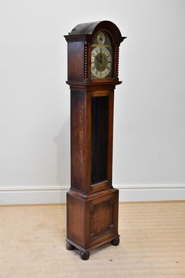 Lot 330 - An early 20th century oak longcase clock, with...