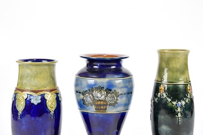 Lot 1350 - ROYAL DOULTON; three Artware vases including...