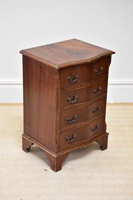 Lot 286 - A reproduction mahogany serpentine fronted...